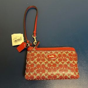 Coach, red zip wristlet, in signature coated canvas